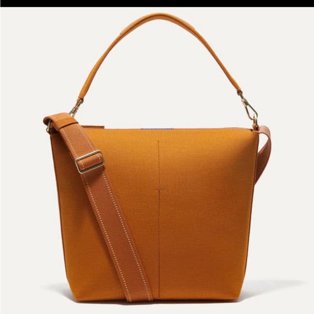 New with tags Rothy’s Mini Zip Bucket handbag in Amber Brown
